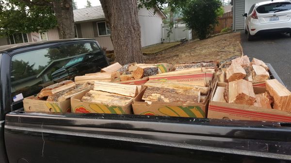 Truckload Of Boxes Filled With Seasoned Firewood For Sale In