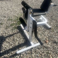 Leg lift curl machine