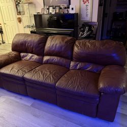 Brown Leather Sofa With Dual Recliners. 