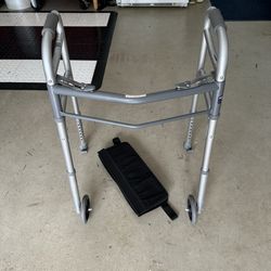 Folding Walker with Rear Skis and a Front Basket