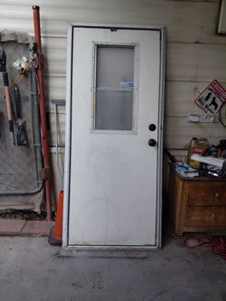 Trailer door with doorframe