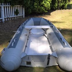  WEST MARINE Fiberglass Single Floor Inflatable Boat