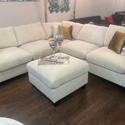 Beige Sectional & Ottoman 