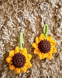 Brand new, crocheted keychains - Sunflower, Daisy, Strawberry - $5 each Location: 56