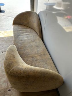 Curved upholstered sofa