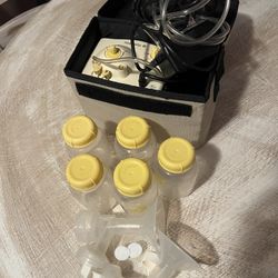 Medela Breastpump And Nursing Items