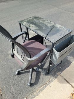 free desk with working outlet and office chair