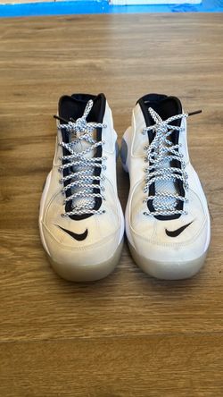 White Nike basketball shoes, size 8