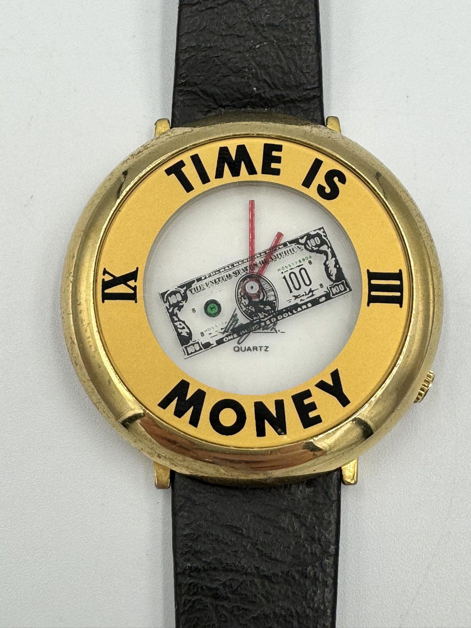 Vintage 1990s Unisex "Time is Money" Rotating 100 Dollar Bill Watch , 46mm Gold