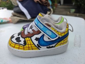 Toddler hand painted Toy Story themed Nikes