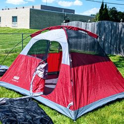Coleman 4 person tent and 2 sleeping bags 