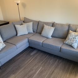 Gray Cloth L- Shaped Couch