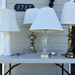 Table Lamps. Very Nice Condition.  All With Shades.  2 Brass With Touch On And Off. 1 White Ceramic. 1 Clear Crystal. $15 Each.  (contact info removed