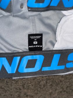 Med women’s softball pants and socks