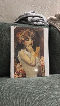 Women looking at a paper curiously