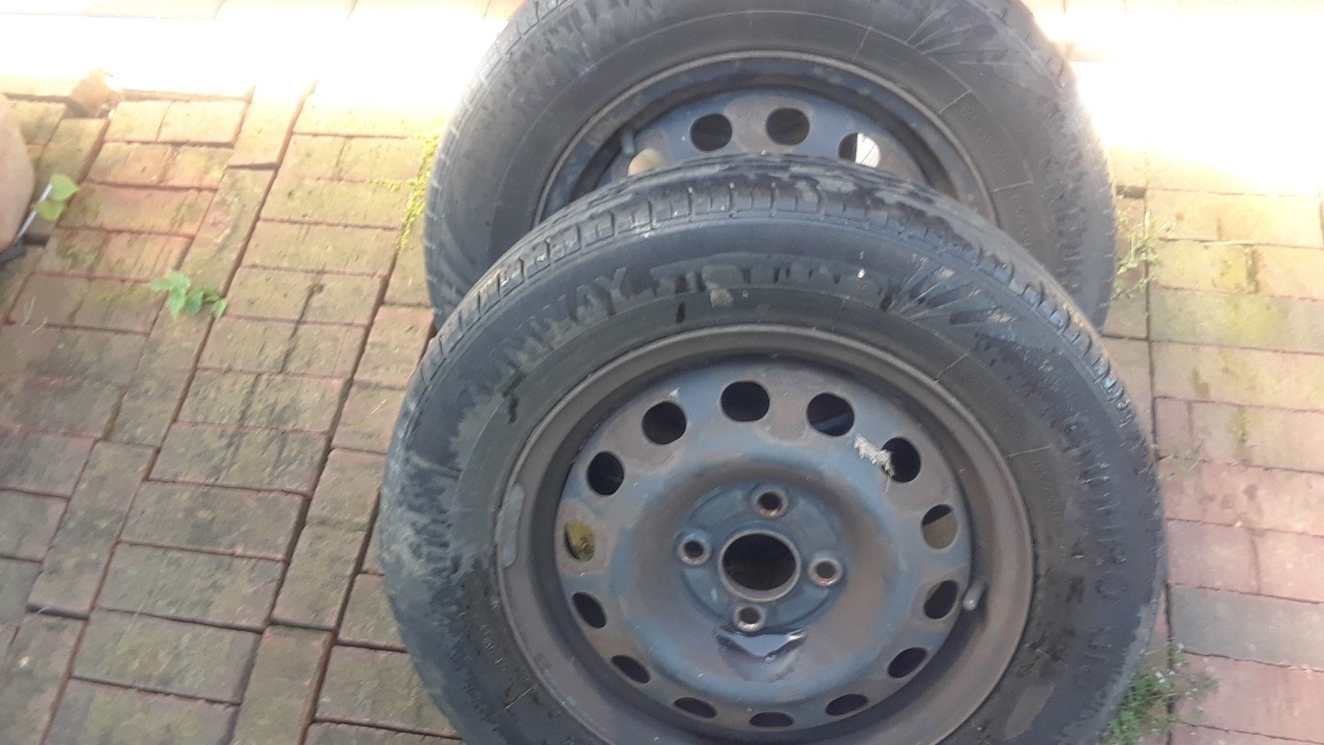 Honda rims and tires both 20.00