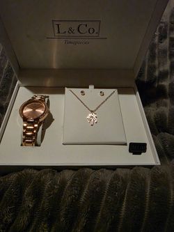 L & Co watch, earing and necklace