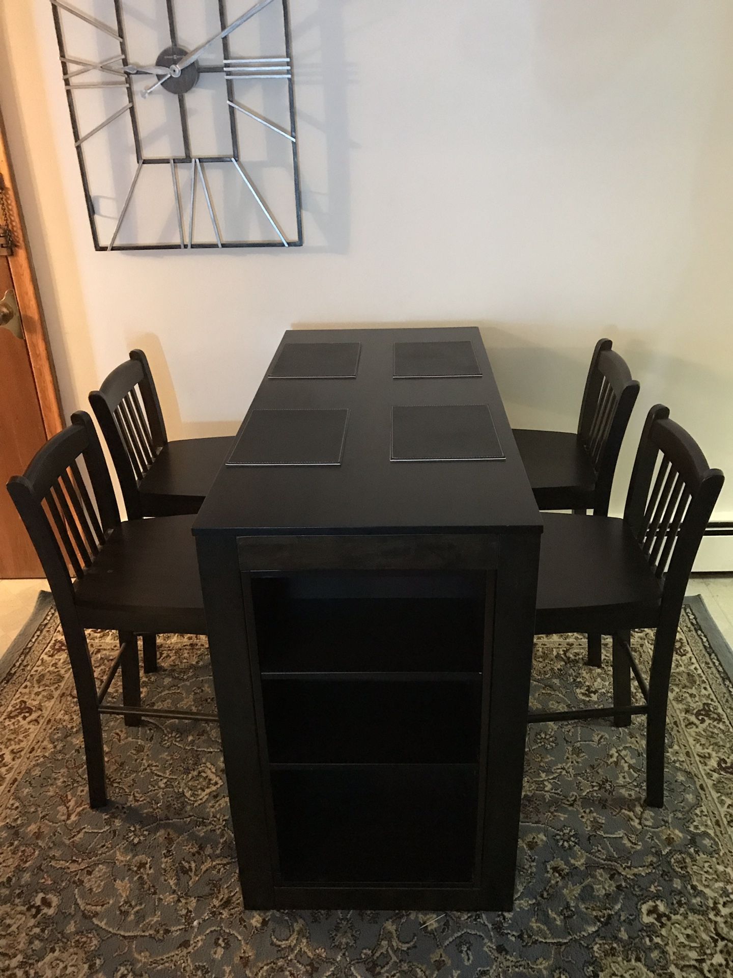 High-top wooden kitchen table with 4 matching stools