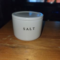*NEW CERAMIC SALT CANISTERS.  LID SEALS CLOSED.  KEEPS SALT FREE AND KEEPS IT FROMGETTING MOISTURE IN IT