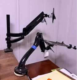 Flex mount laptop holder that attaches to a desk.