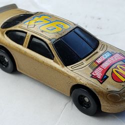 Hot Wheels #94 50th Anniversary NASCAR McDonalds 1/64 Ford Taurus Gold Diecast

