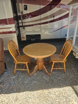 Oak dining room table and chairs