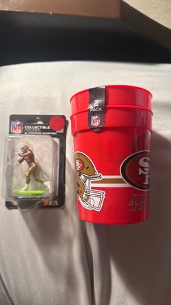 Christian Mccaffery collectible figure and two 49er cups