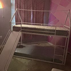 Bunk bed with slide. 