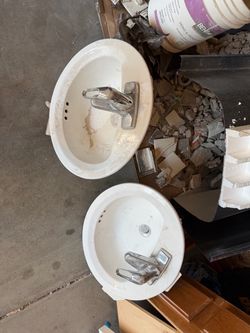 2 vanity sinks with faucets
