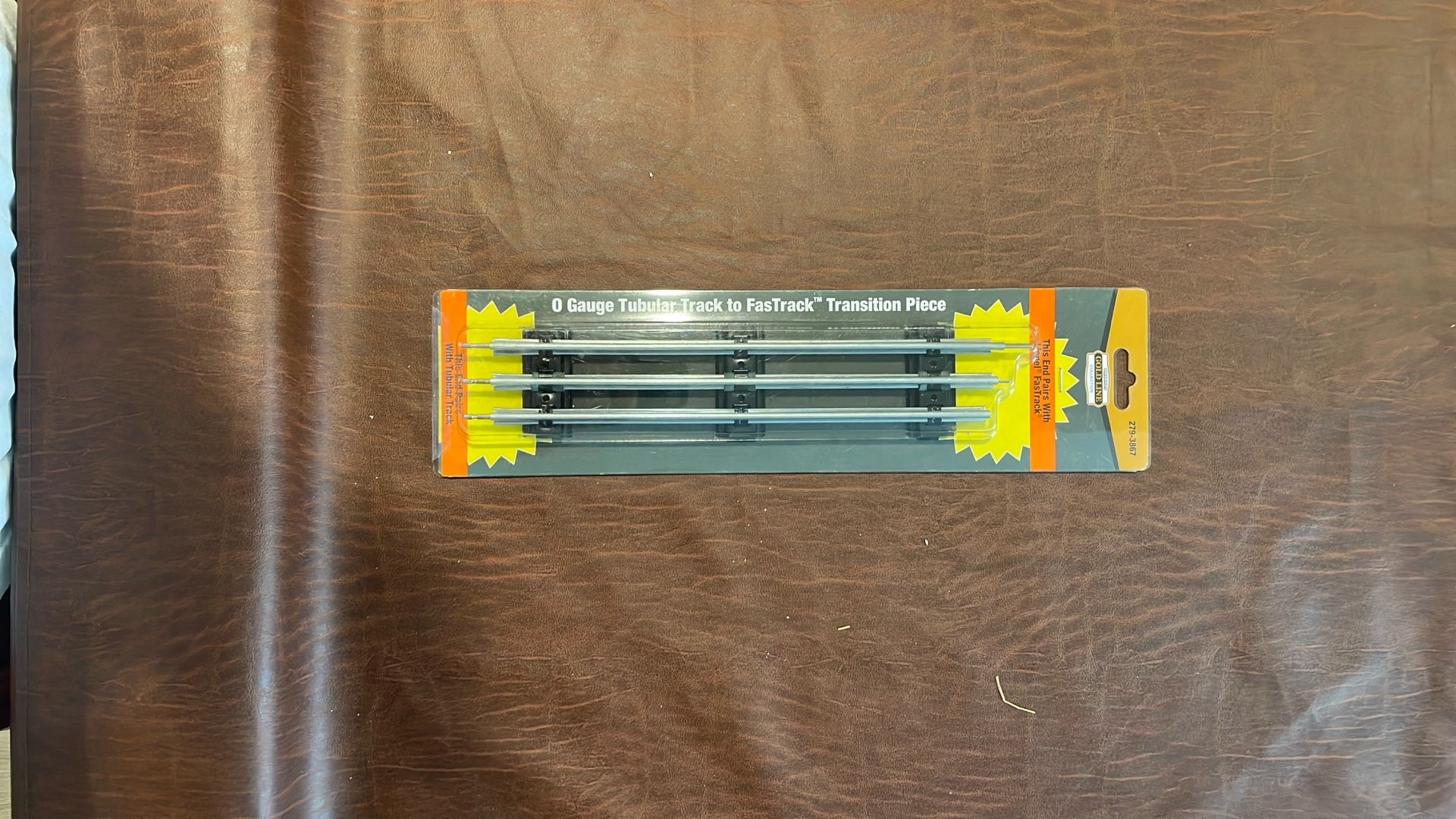 Menards (contact info removed) O Gauge Tubular Track to FasTrack Transition Piece
