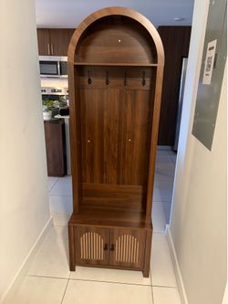 Brown coat and shoe storage rack