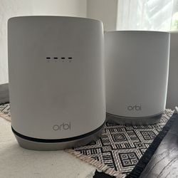NETGEAR Orbi WiFi 6 Mesh Router Modem with Satellite range extender