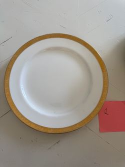 Listing is for a single plate  The Minton England Gilt Porcelain Dinner Plate from 1 is a vintage piece of dinnerware manufactured in England 