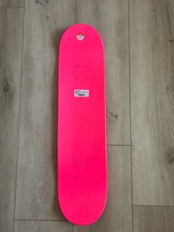 Neon pink skateboard deck