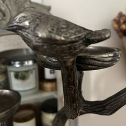 Heavy bird candle holder