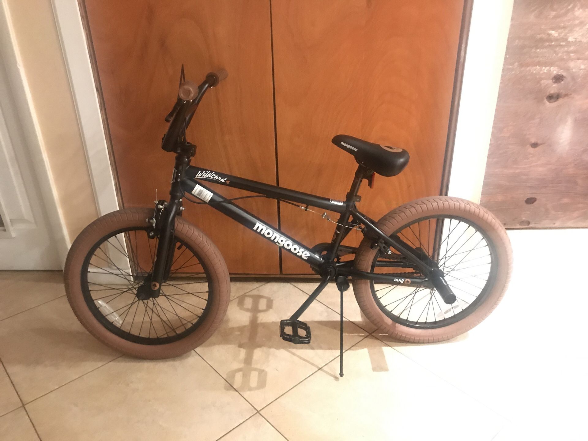 Mongoose,Wildcard,Bmx Bike,Little bit used,nice bike,Comes with brake grip,Awsome condition.
