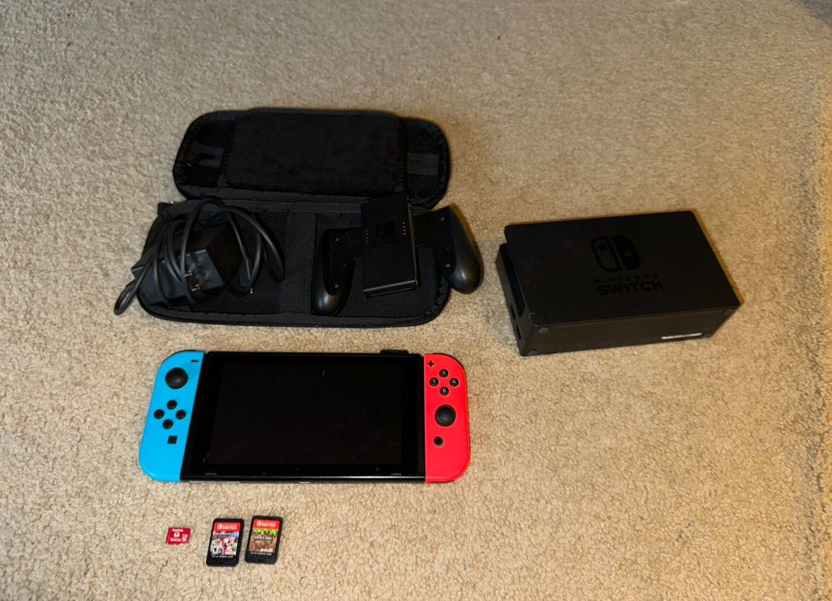 Nintendo switch with case and games 