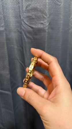 Gold-Tone Bangle Bracelet with Crystal Stones