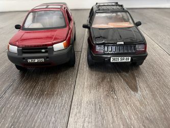 Diecast 1/18 scale jeep grand Cherokee 1997 and Land Rover freelander both for 25 dollars