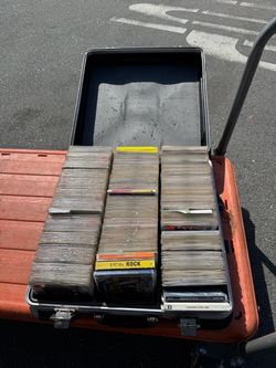 CDs A lot of them all generes  cases not DJing anymore. They are in sleeves with the cover pick in front about 7  cases.