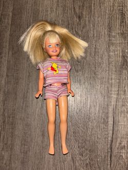 1997 vintage Barbie doll with Pooh clothing