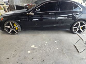 Black Mercedes-Benz Sedan
