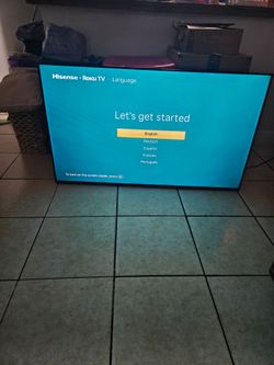 58 Inch Roku TV with wall mount attached.