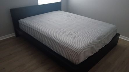 Bed with frame and headboard
