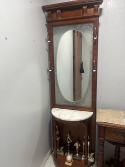 Vintage pulaski hall tree with mirror and marble