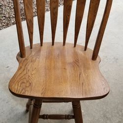 2 solid oak swivel bar stools