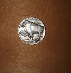 2 different nickles 1 without a date but it's silver. The other is 1926
