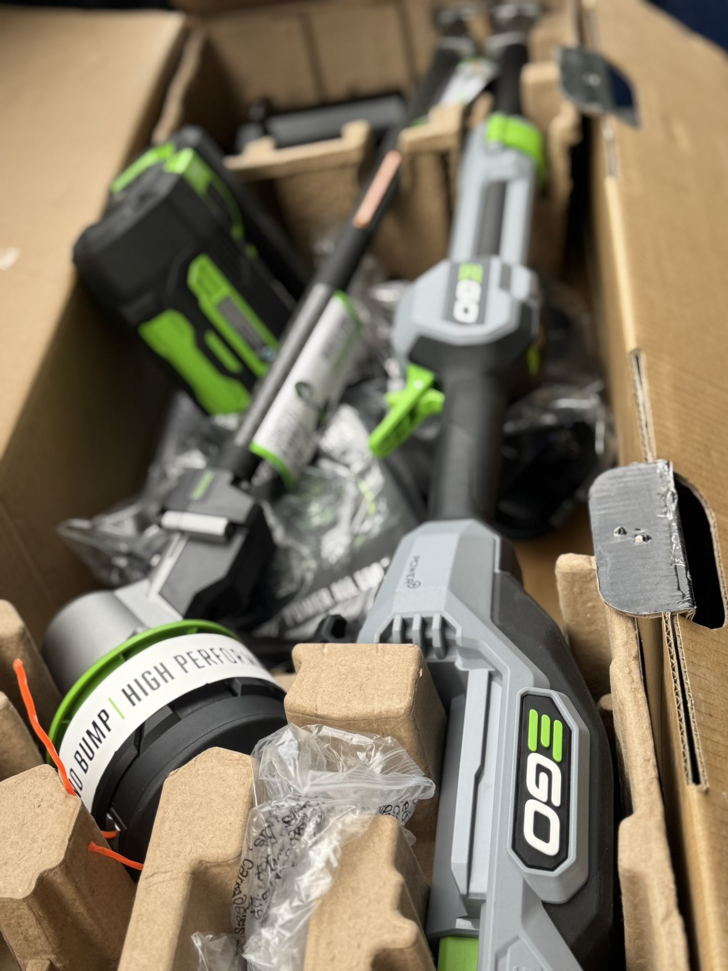 EGO POWER + POWERLOAD with LINE IQ 56-volt 16-in Telescopic Shaft Battery String Trimmer 4.0 Ah (Battery Included) (Charger Included)