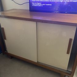 tv stand with sliding doors 