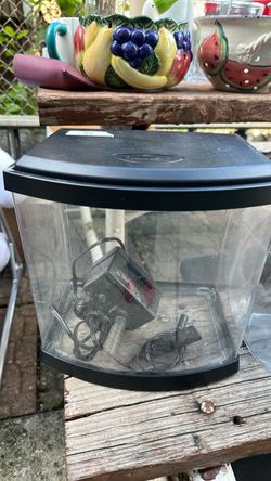 eon MiniBow Aquarium with a black lid and base, containing internal accessories like a filter pump.
